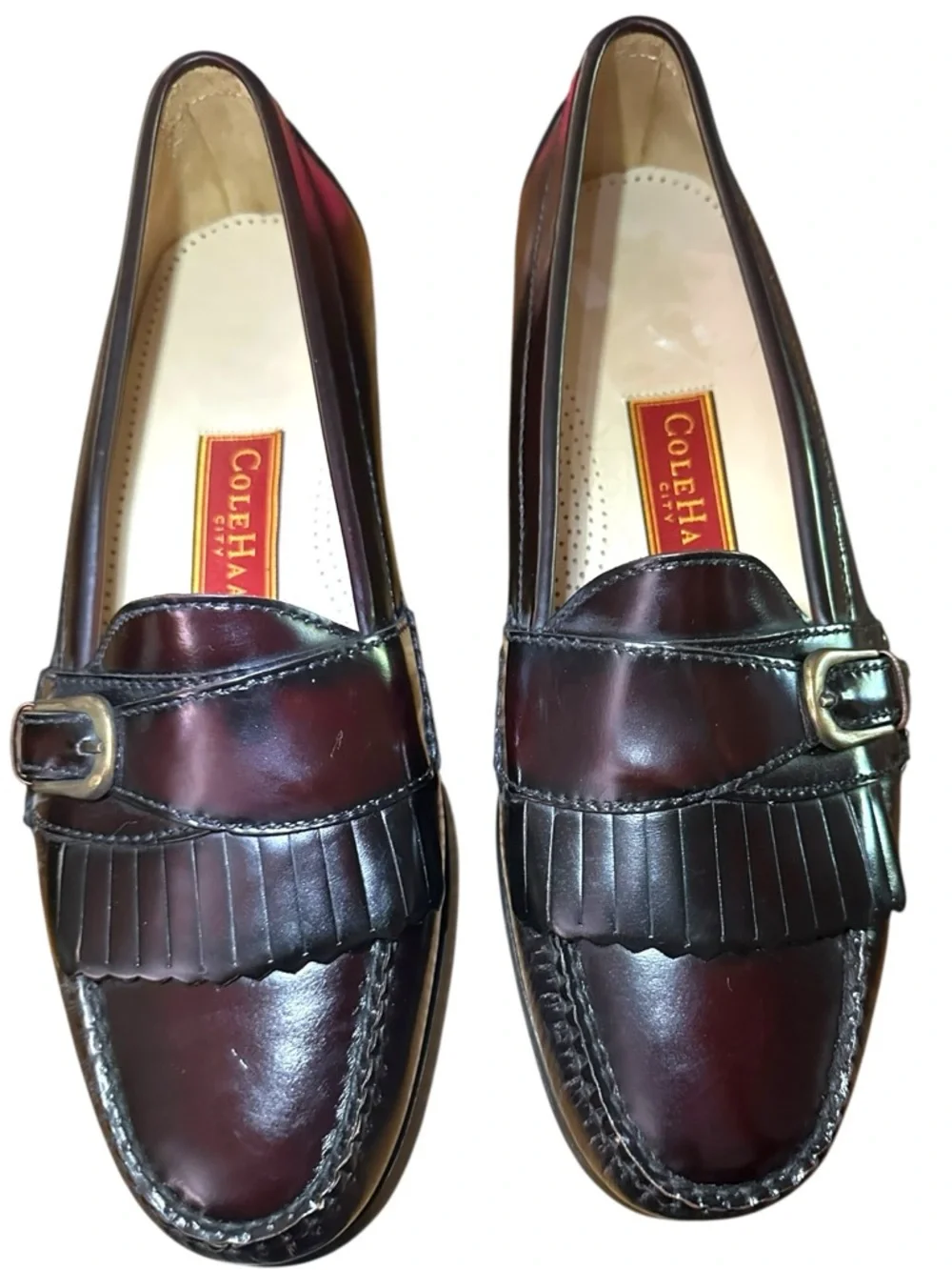 Cole Haan Pinch Buckle Kiltie Loafer (Style 03516) in a burgundy leather finish